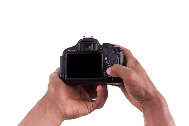 istock African american photographer holding a digital camera 178875653