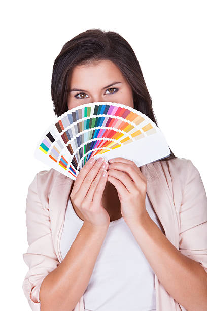 istock Attractive woman chooses a color scheme 178876159