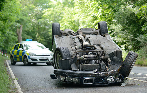 upside down car Car accident crash flipped upside down, road closed by police upside down stock pictures, royalty-free photos & images