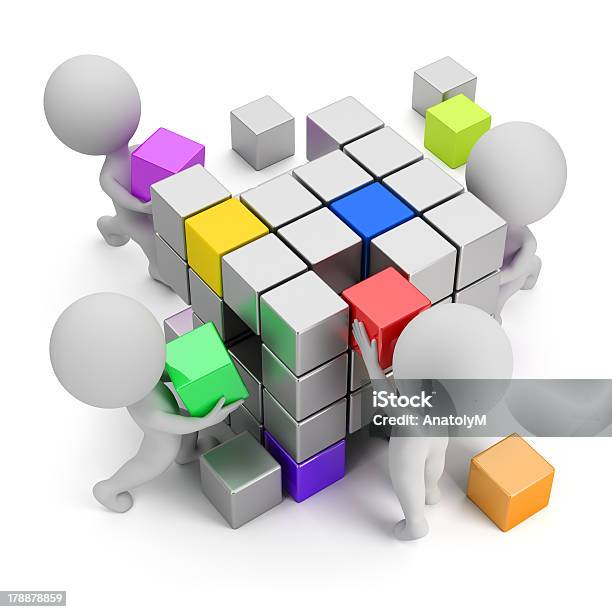 Four Cartoon Characters Building A Cube With Smaller Cubes Stock Photo - Download Image Now
