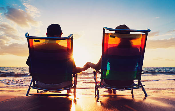 istock senior couple watching the sunset 178878864