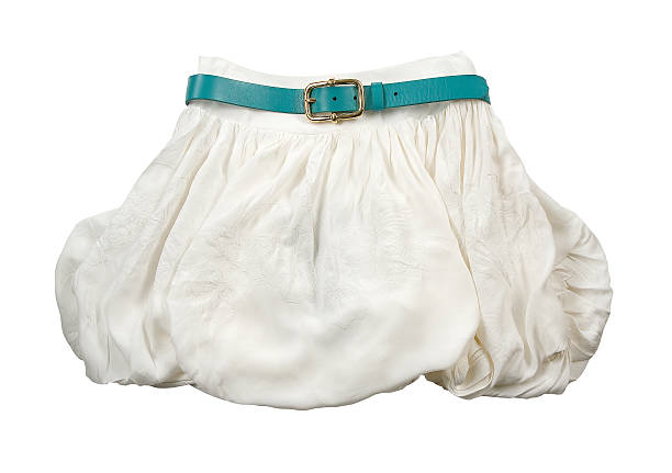 White bubble mini skirt with green belt White bubble mini skirt with flowers embroidery and green belt, isolated on white background. Clipping path included. puff ball gown stock pictures, royalty-free photos & images