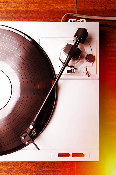 istock Turntable playing vinyl record with music 178879022
