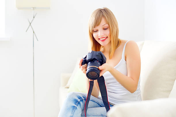 istock Teenage girl with digital camera 178879143