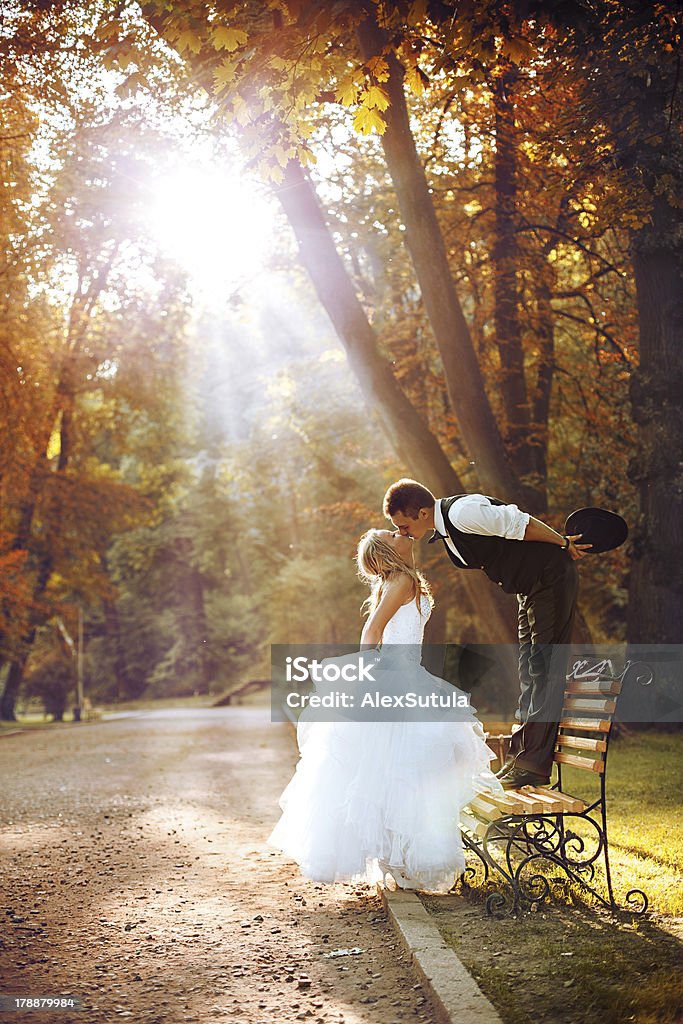 European bride and groom European bride and groom kissing in the park Adventure Stock Photo