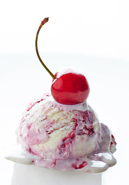 istock scoop of fruit ice cream on white plate 178880638