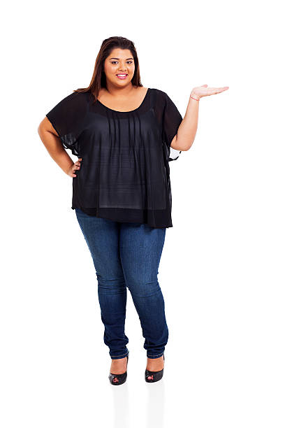 istock lovely plus size woman presenting 178881252