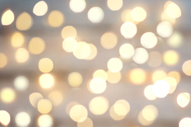 istock Background with abstract golden sparkling christmas lights. Bokeh effect. Defocused. Template mock up for holiday card. Copy space for text 1788815185