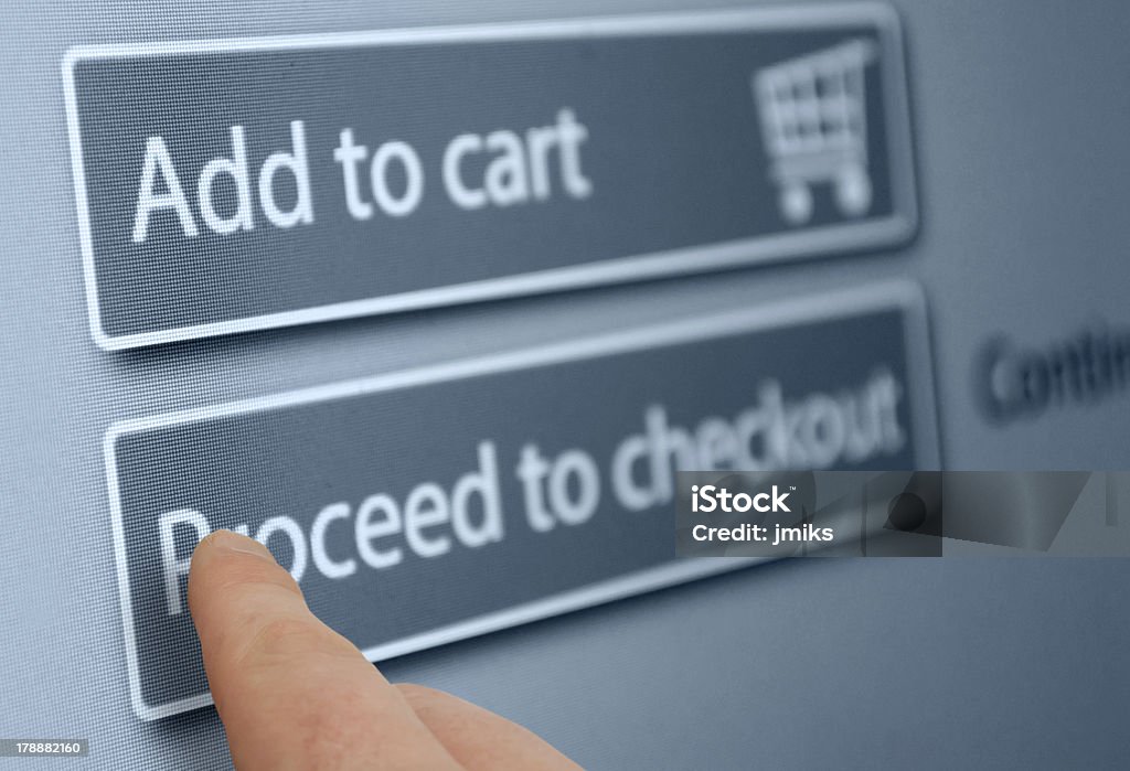 Online Shopping Online Shopping - Finger Pushing Add To Cart Button On Touchscreen Basket Stock Photo