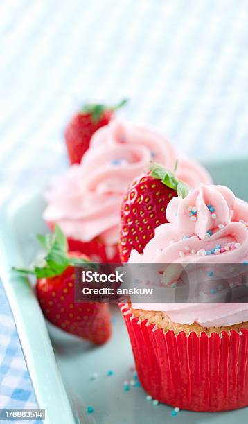 Cupcakes With Fresh Strawberries And Sprinkles Stock Photo - Download Image Now - Baked, Blue, Cake