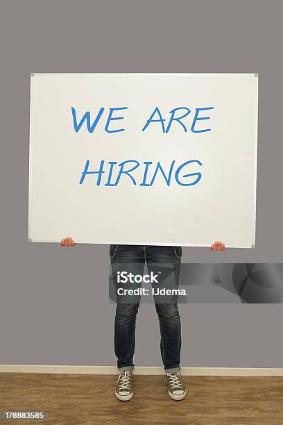 Woman Holding We Are Hiring Sign Stock Photo - Download Image Now - We are Hiring, Adult, Adults Only