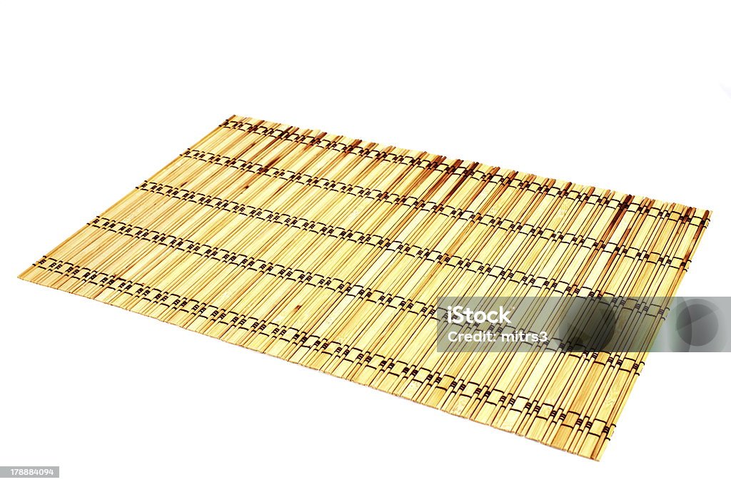 bamboo mats against the white background Photo of hand-made bamboo mats against the white background Asia Stock Photo