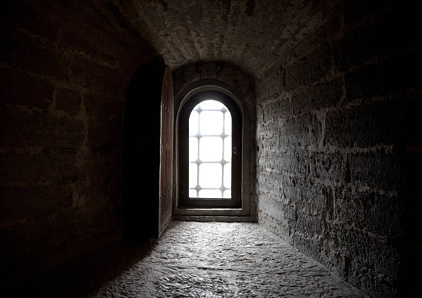 istock Window in the wall of ancient European castle 178884365