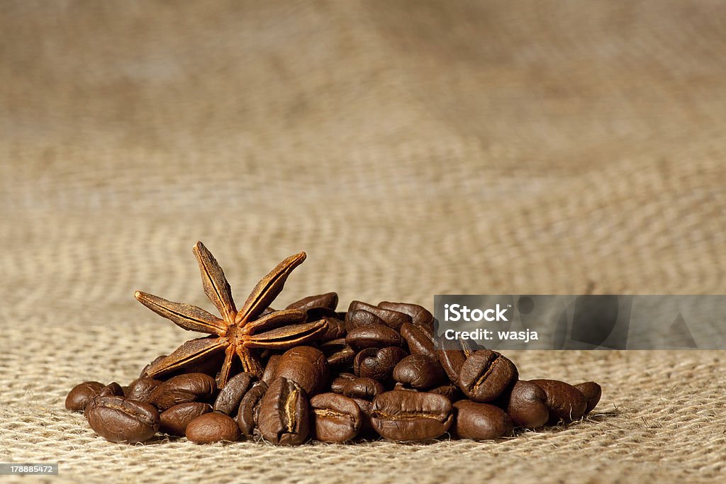 Coffee and Star Anise on sackcloth with copyspace Coffee and Star Anise on sackcloth background with copyspace Agriculture Stock Photo