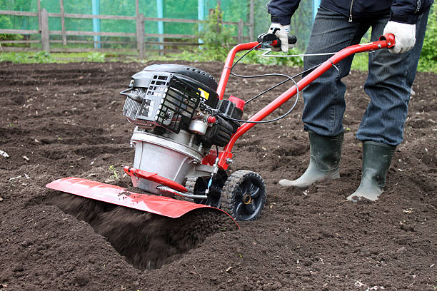 Garden tiller to work Garden tiller to work garden hoe photos stock pictures, royalty-free photos & images