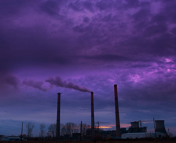 istock Heavy smoke spewed from coal powered plant 178888116