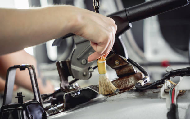 istock Worker make dry cleaning the car interior using a special brush with foam 1788883172