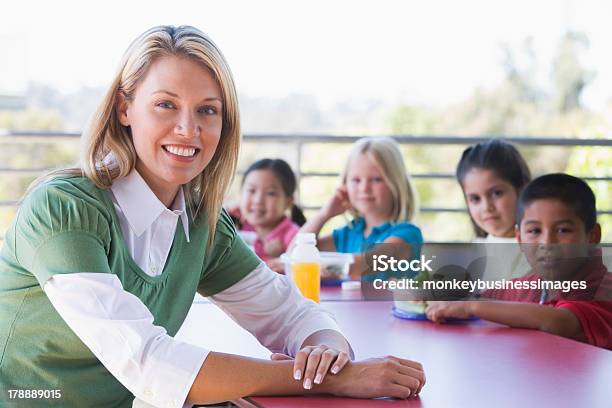 Kindergarten Children Eating Lunch Stock Photo - Download Image Now - Preschool, Preschool Building, Guidance