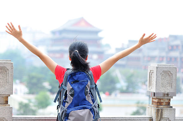 istock young asian woman open arms 178889972