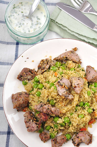 istock Quinoa with peas and lamb meat 178891294