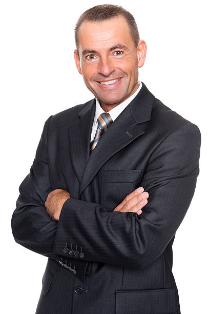 istock Smiling businessman with arms folded across his chest 178891545