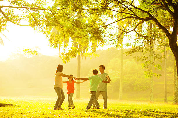 istock Happy Asian family playing 178892960