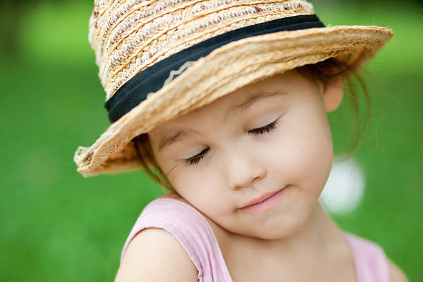 Child in a hat stock photo