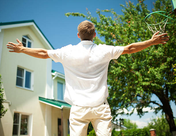 istock Happy man watching new big house 178893671