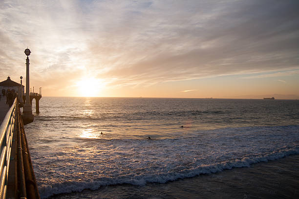 istock Surfers in the sunset near pier 178894148