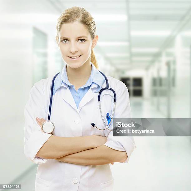 Confident Doctor Stock Photo - Download Image Now - Adult, Doctor, Focus On Foreground