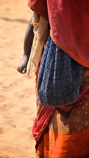 istock Poor mother with baby 178894578