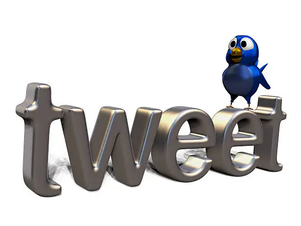 Photo of Blue twittering bird standing on the word tweet