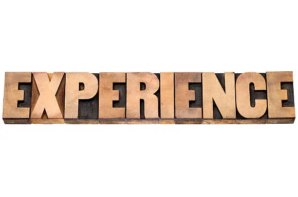 Photo of experience word in wood type