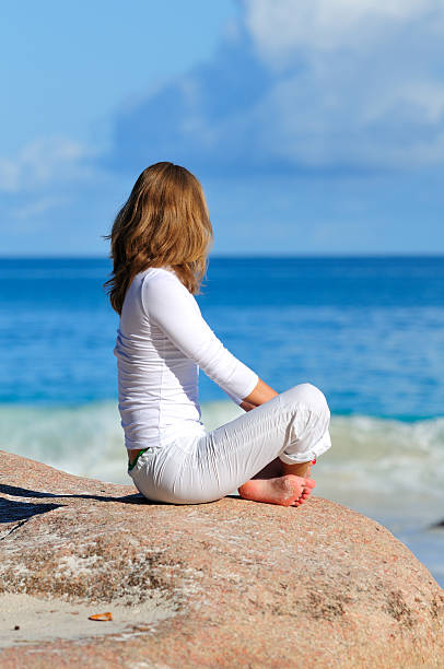 istock Young woman on the beach 178895509