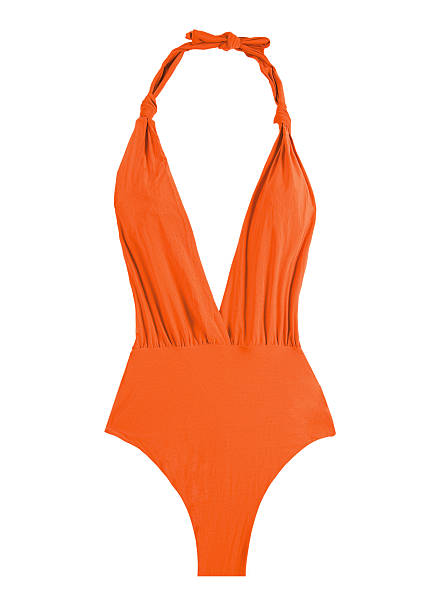 orange hembra traje de baño - halter fotografías e imágenes de stock