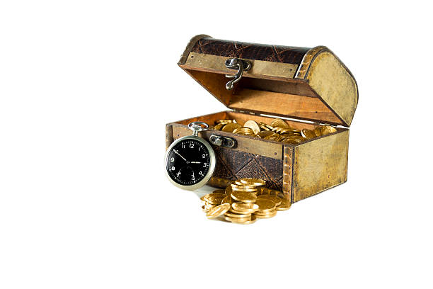 istock Chest full  gold coins of the old clock 178896430