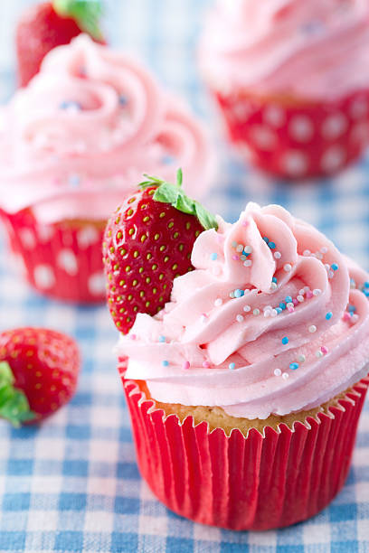 istock Strawberry cupcakes on vintage blue towel 178896853