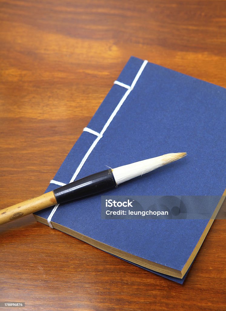 chinese book and writing brush Abstract Stock Photo