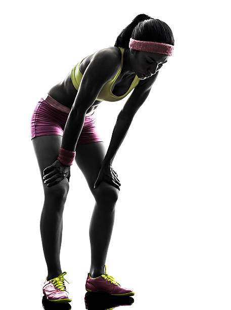 istock Woman athlete resting after running  178897099