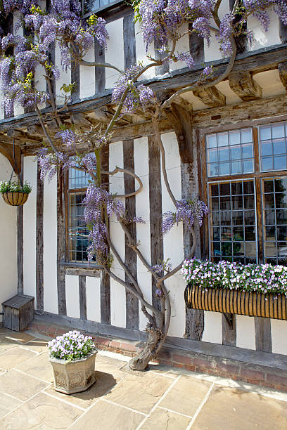 Lavenham is a village and civil parish in Suffolk, England. It is noted for its 15th-century church, half-timbered medieval cottages and circular walk. In the medieval period it was among the 20 wealthiest settlements in England. Today, it is a popular day-trip destination for British people from across the country and Americans from the air bases of Lakenheath and Mildenhall, along with another historic wool town in the area, Long Melford.