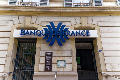 Close-up of logo at entrance of branch of Bank of France at City of Toulon on a cloudy late spring day. Photo taken June 9th, 2023, Toulon, France.