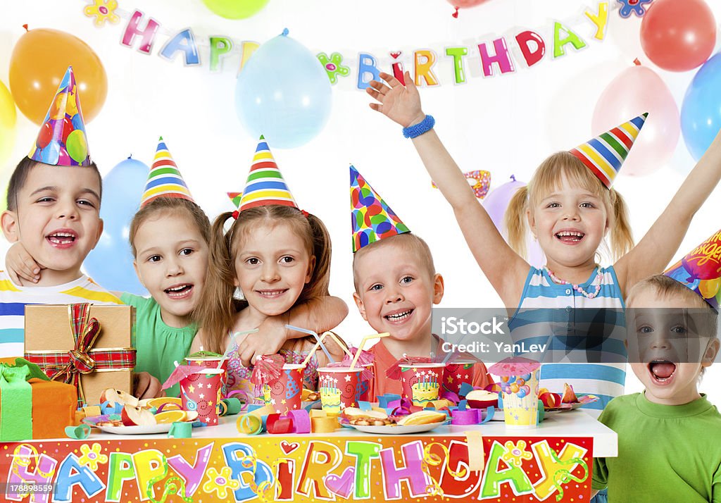 Happy birthday group of children at birthday party Balloon Stock Photo