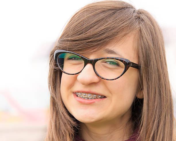 istock Smiling young teenager with braces 178898664