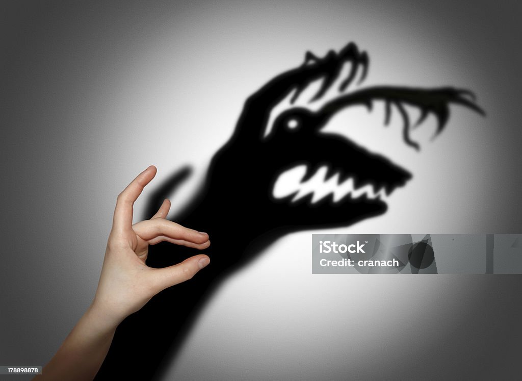 Fear, shadow on the wall "Fear, fright, shadow on the wall" Schizophrenia Stock Photo