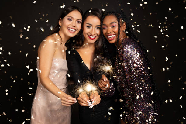 istock Happy young multicultural girlfriends in nice outfits celebrating New Year 1789001473