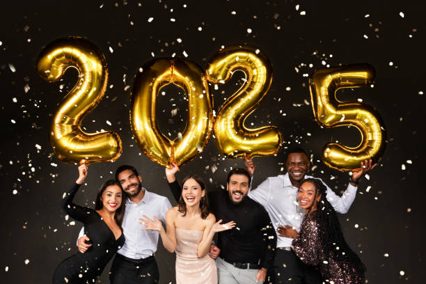 istock Happy multiracial people celebrating new year 2025 on black 1789001480