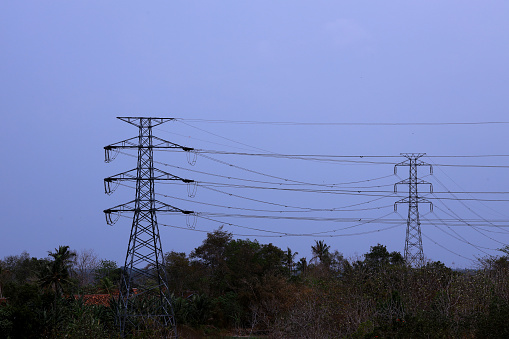 High voltage overhead power lines - stock photo