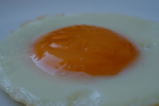 select focus yolk of fried egg