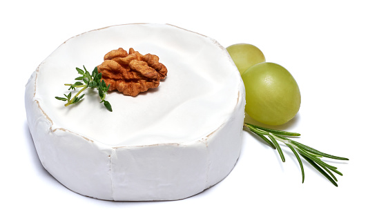 Fresh Brie or Camembert cheese Isolated on a white background.