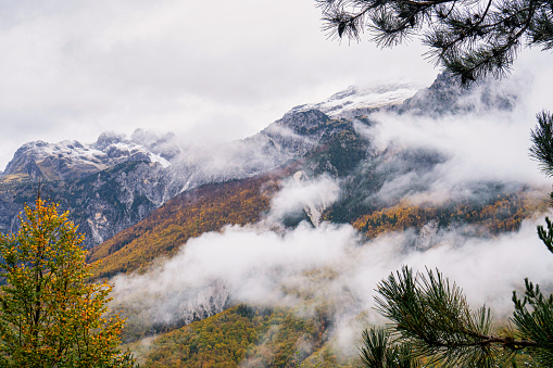 Cloudy Landscape of Thethi National Park showing the amazing colors of Autumn.
